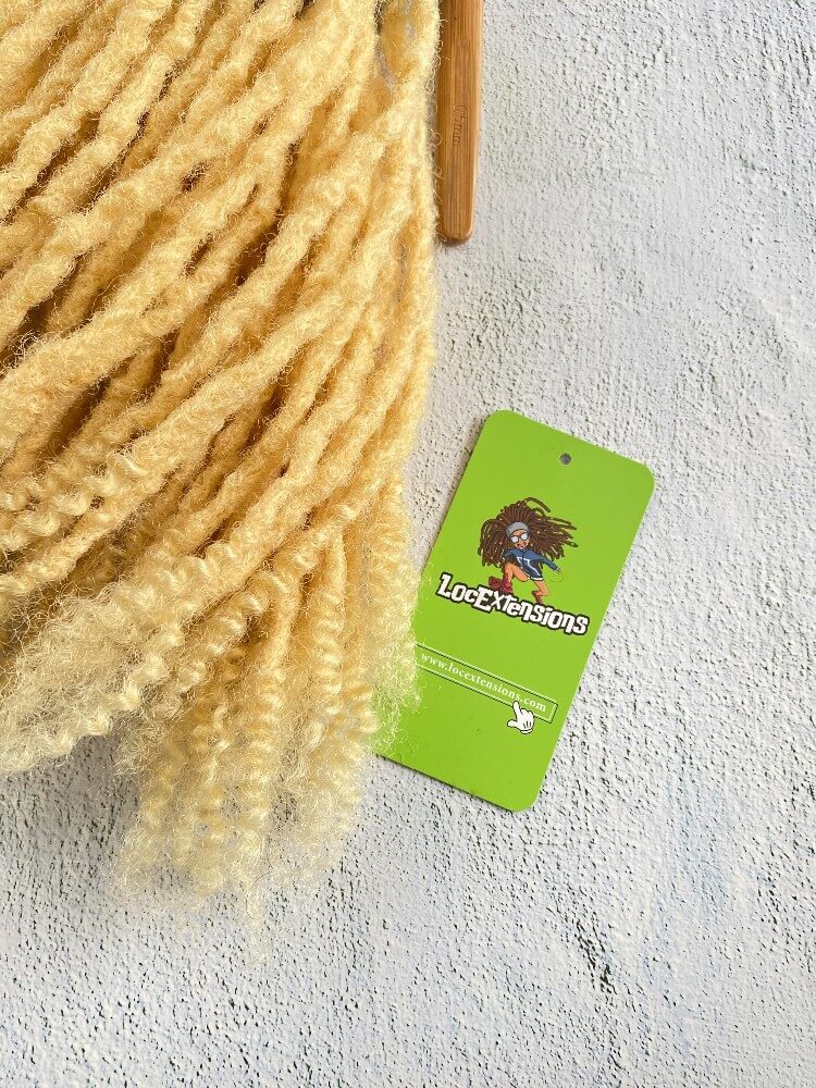 Curly Anwi textured human hair loc extensions with T1B/613 blonde tips