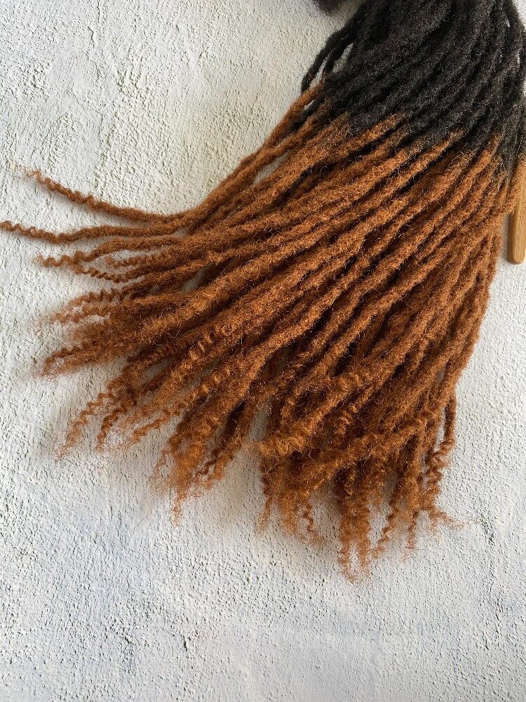 Ombre curly Anwi textured human hair loc extensions with honey-colored tips